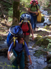  Men with custom-fit Wabakimi canoe pack on portage 